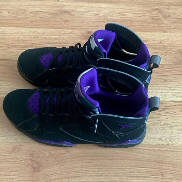 purple and black jordans 10